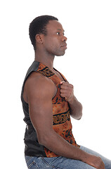 Image showing Good looking African man in a brown vest