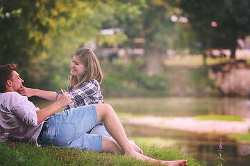 Image showing Couple in love enjoying picnic time