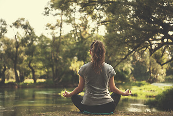 Image showing woman meditating and doing yoga exercise