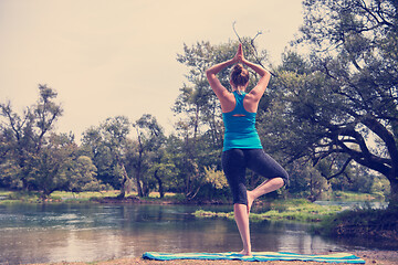 Image showing woman meditating and doing yoga exercise