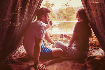 Image showing couple spending time together in straw tent