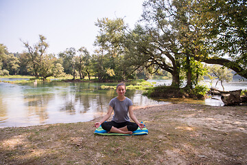 Image showing woman meditating and doing yoga exercise