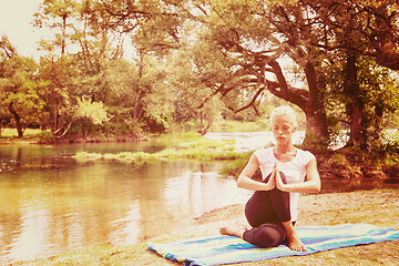 Image showing woman meditating and doing yoga exercise