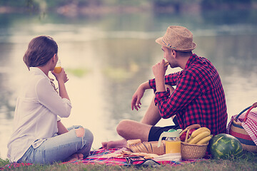 Image showing Couple in love enjoying picnic time