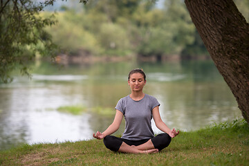 Image showing woman meditating and doing yoga exercise