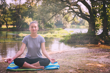 Image showing woman meditating and doing yoga exercise