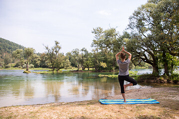 Image showing woman meditating and doing yoga exercise