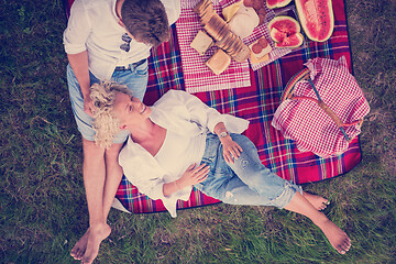 Image showing top view of couple enjoying picnic time