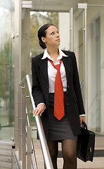 Image showing businesswoman with portfolio