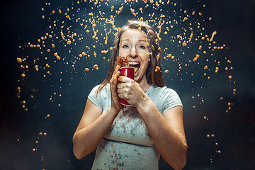 Image showing Woman drinking a cola