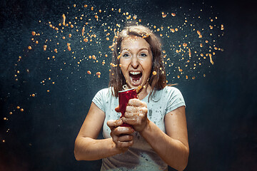 Image showing Woman drinking a cola