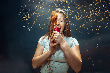 Image showing Woman drinking a cola