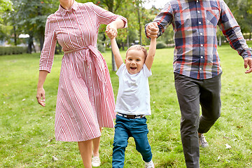 Image showing happy family having fun at summer park