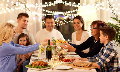 Image showing happy family having dinner party at home