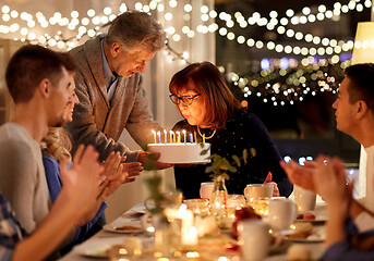 Image showing happy family having birthday party at home