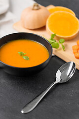 Image showing close up of vegetable pumpkin cream soup in bowl