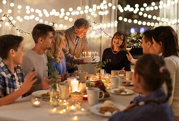 Image showing happy family having birthday party at home