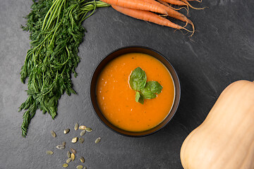 Image showing close up of pumpkin cream soup and vegetables