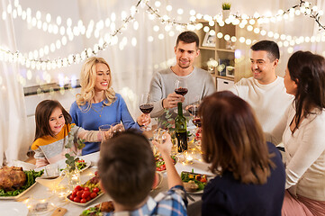 Image showing happy family having dinner party at home