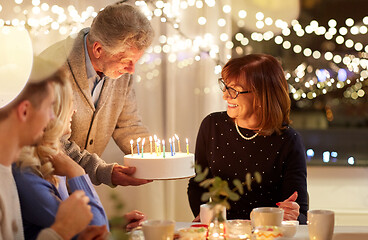 Image showing happy family having birthday party at home