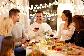 Image showing happy family having dinner party at home