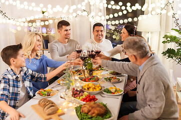 Image showing happy family having dinner party at home