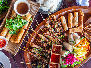 Image showing Vietnamese wraps and barbecue sticks