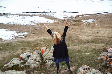 Image showing Happy woman in the winter landscape