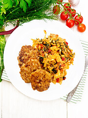 Image showing Fritters meat with cabbage in plate on board top