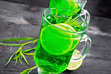 Image showing Lemonade Tarragon in two goblets on dark wooden board