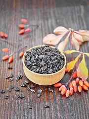 Image showing Barberry dried in bowl on dark board