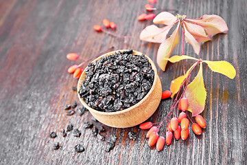 Image showing Barberry dried in bowl on board