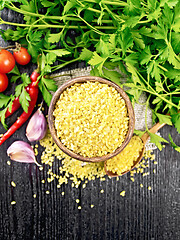 Image showing Bulgur in bowl with vegetables on board top