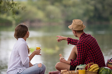 Image showing Couple in love enjoying picnic time