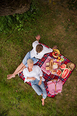 Image showing top view of couple enjoying picnic time