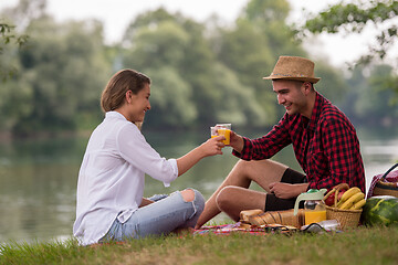 Image showing Couple in love enjoying picnic time