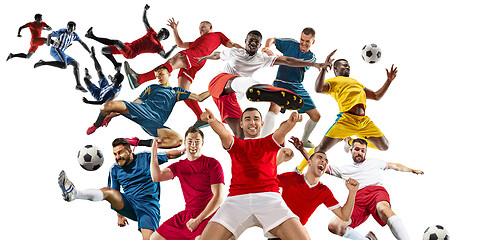 Image showing Professional men - football soccer players with ball isolated wh