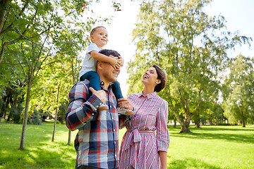 Image showing happy family having fun at summer park