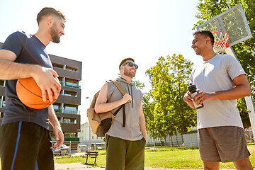 Image showing group of male friends going to play basketball