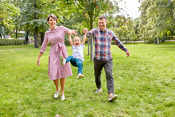 Image showing happy family having fun at summer park