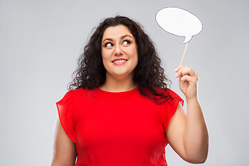 Image showing happy woman in red dress holding speech bubble