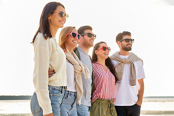 Image showing happy friends on summer beach