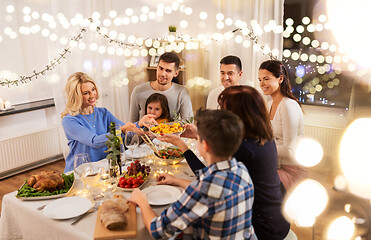 Image showing happy family having dinner party at home