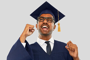 Image showing happy indian graduate student celebrating success