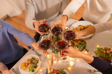 Image showing happy family having dinner party at home