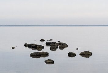 Image showing Scene with rocks in calm water