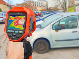 Image showing Recording with thermal camera showing parked cars at town parkin