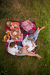 Image showing top view of couple enjoying picnic time