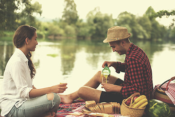 Image showing Couple in love enjoying picnic time