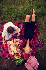 Image showing top view of couple enjoying picnic time